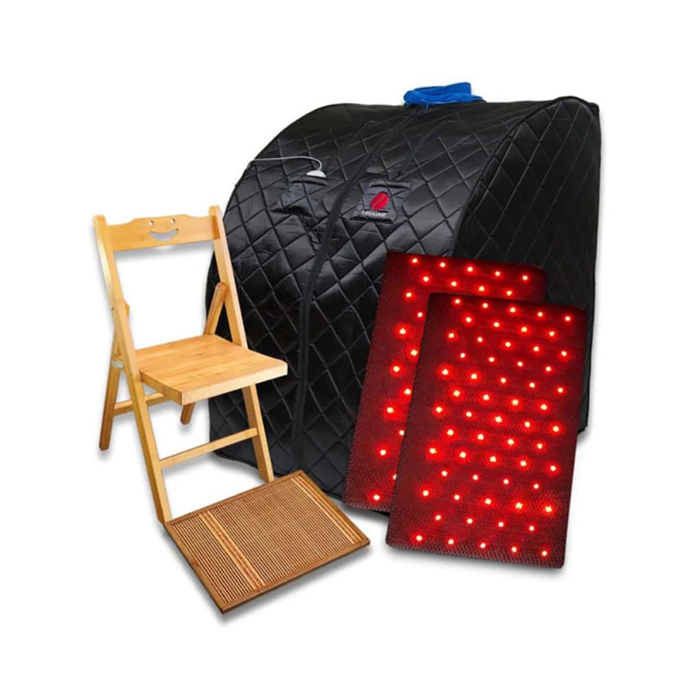 Therasage portable sauna beside a wooden chair and illuminated light panels